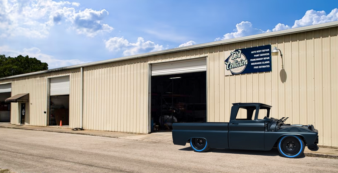 Exterior view of LBJ Collision auto body repair shop with multiple service bays and signage.